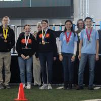 Medalists from different schools standing together